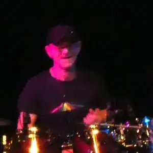 Woody Woodmansey performing with Holy Holy
