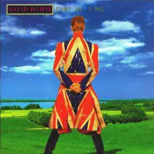 David Bowie wearing an Alexander McQueen coat during the late 1990s