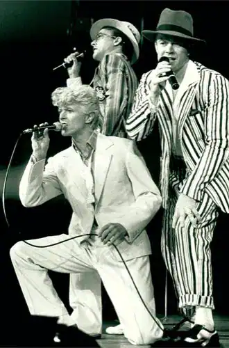 David Bowie, George Simms and Frank Simms performing on stage during the Serious Moonlight Tour, 1983